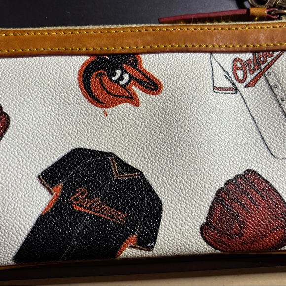 Dooney & Bourke Sports-Themed Wristlet with Black and Brown Accents - Picture 6 of 8